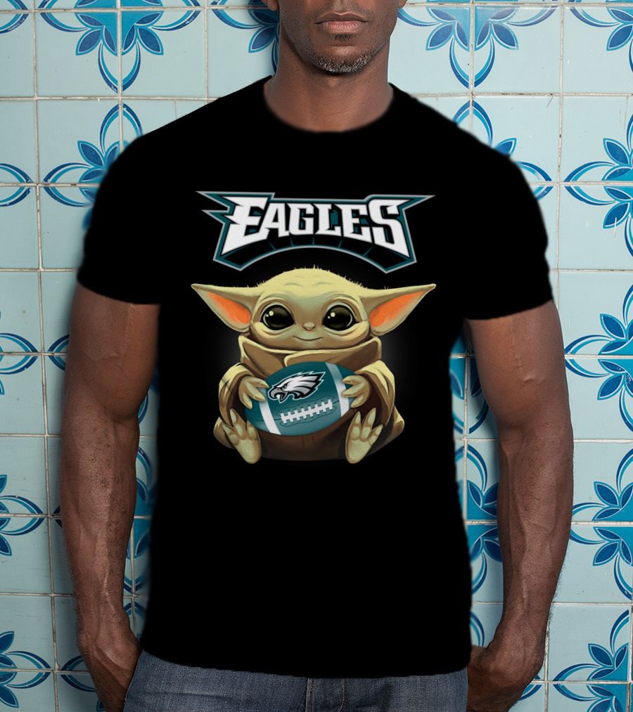 Eagles Philadelphia Baby Yoda Football Holding Eagles Logo Football T-Shirt