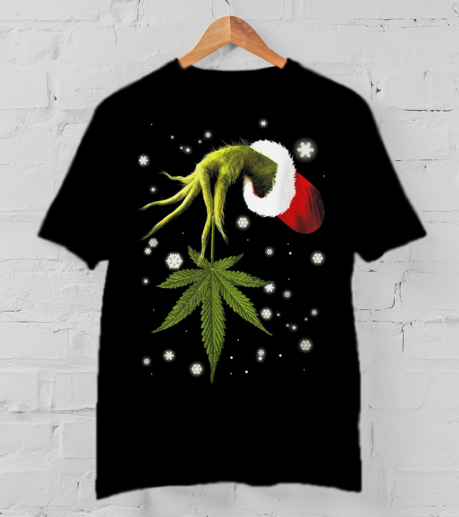 Grinch Hand Holding Cannabis Leaf With Santa Hat And Snowflakes T-Shirt