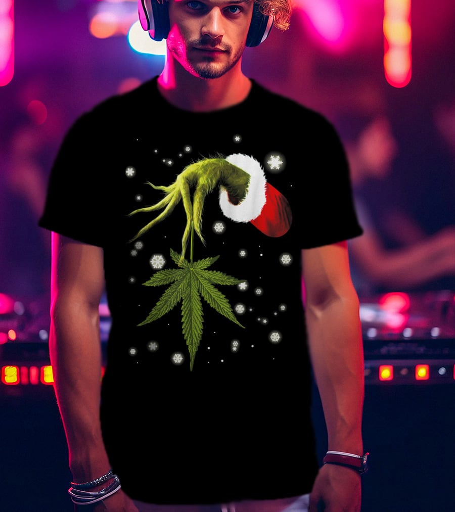 Grinch Hand Holding Cannabis Leaf With Santa Hat And Snowflakes T-Shirt