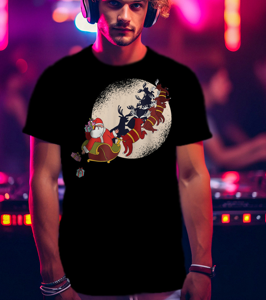 Santa Claus Flying With Reindeers Silhouette Under Full Moon Carrying Gift Sack T-Shirt