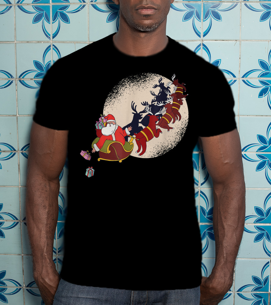 Santa Claus Flying With Reindeers Silhouette Under Full Moon Carrying Gift Sack T-Shirt