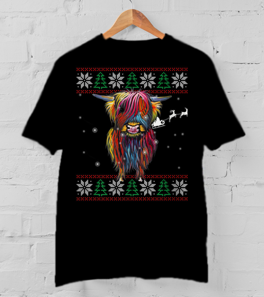 Festive Rainbow Highland Cow With Santa Sleigh And Snowflakes Christmas T-Shirt