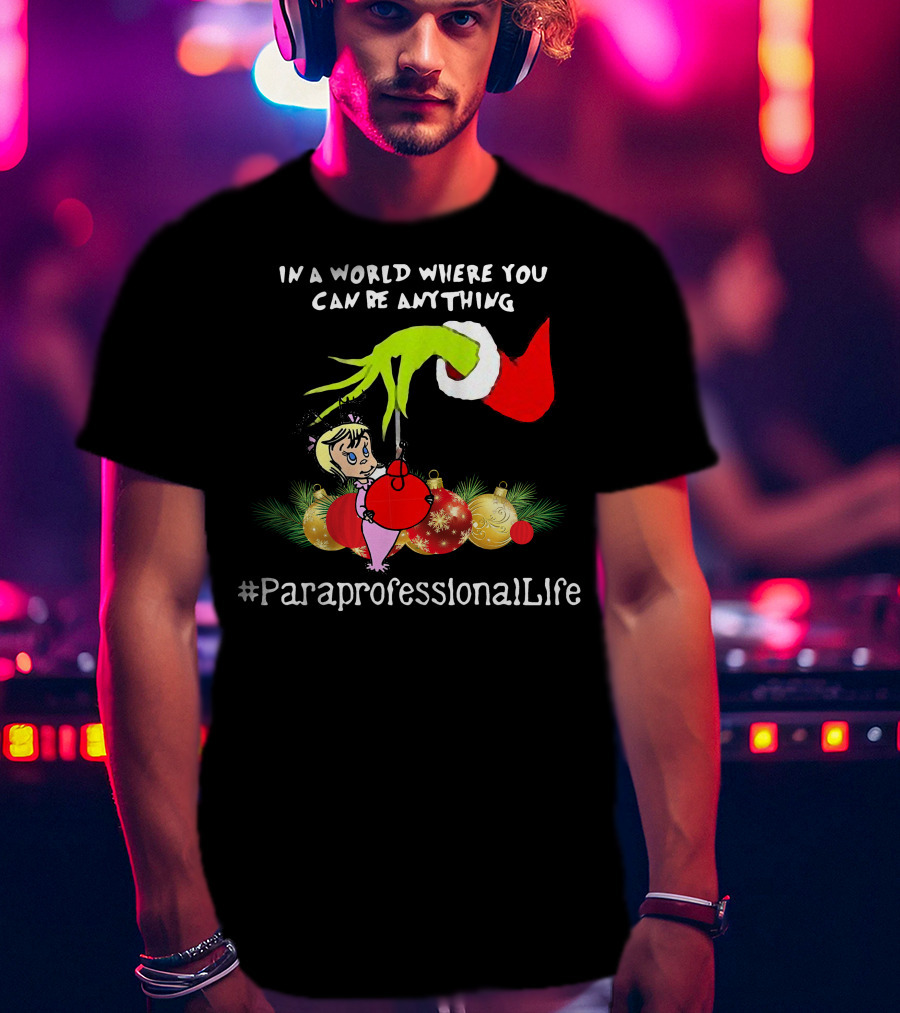 In A World Where You Can Be Anything Hand Grinch Holding Ornaments #ParaprofessionalLife T-Shirt