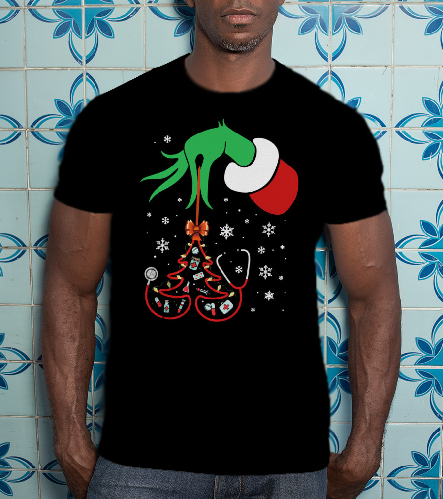 Grinch Hand Holding Nurse Themed Christmas Tree With Medical Icons T-Shirt