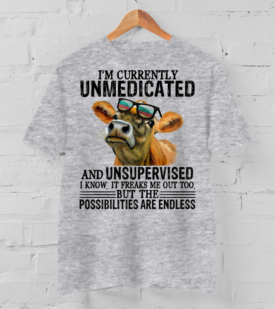 I’m Currently Unmedicated And Unsupervised Cow With Sunglasses Possibilities Are Endless T-Shirt