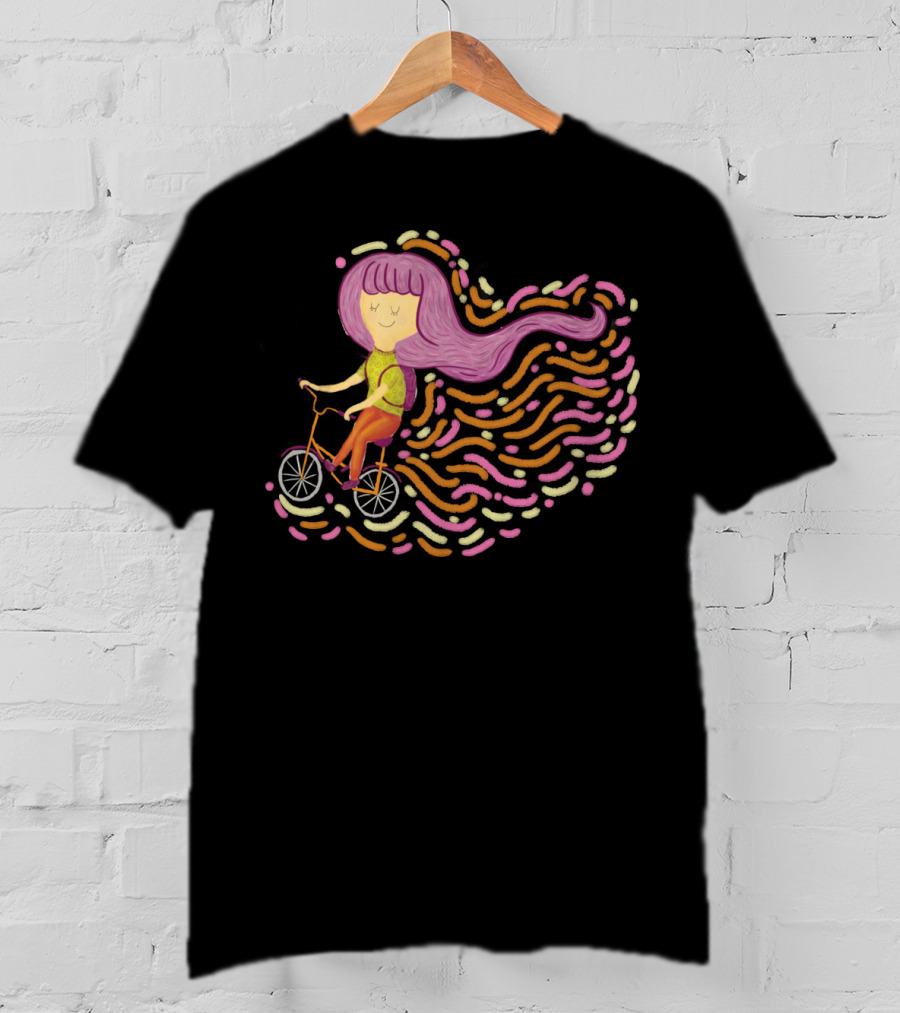 Claire Riding Bicycle With Flowing Pink Hair And Colorful Trails T-Shirt