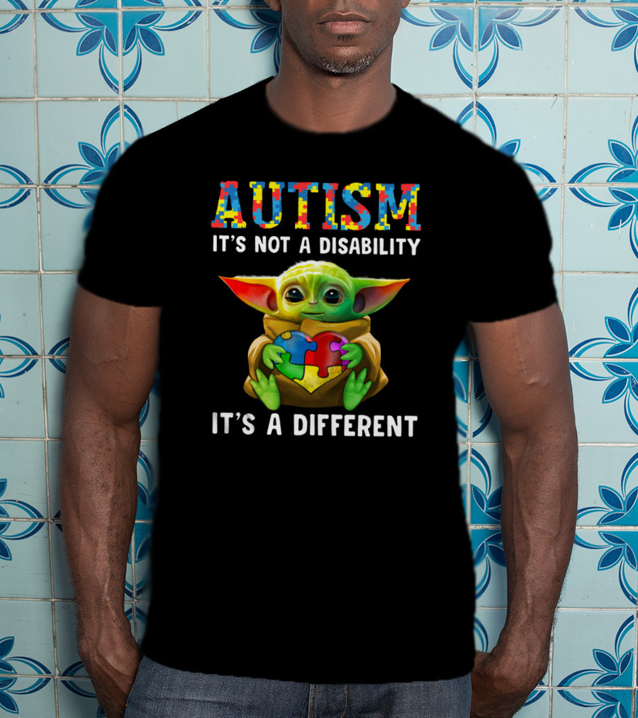 AUTISM IT'S NOT A DISABILITY IT'S A DIFFERENT Baby Yoda Holding Puzzle Piece T-Shirt