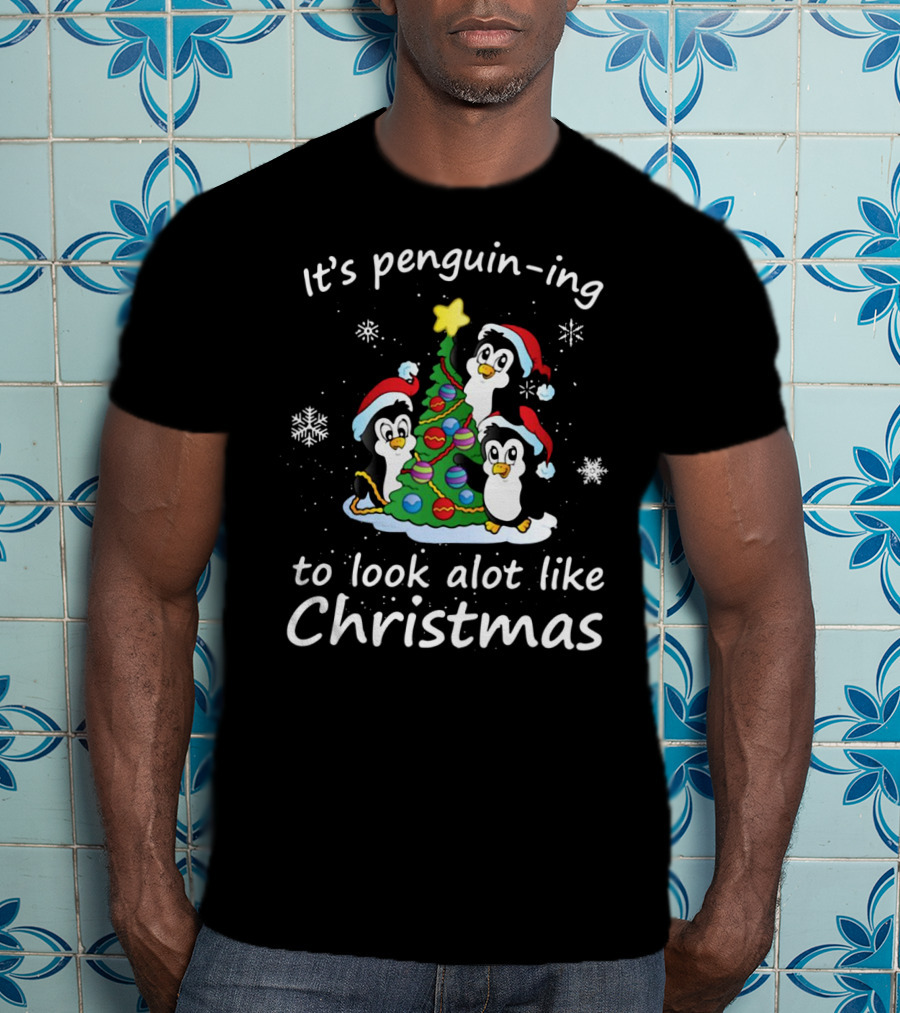 Penguin-ing To Look Alot Like Christmas Penguins Tree Santa Hats Snowflakes T-Shirt