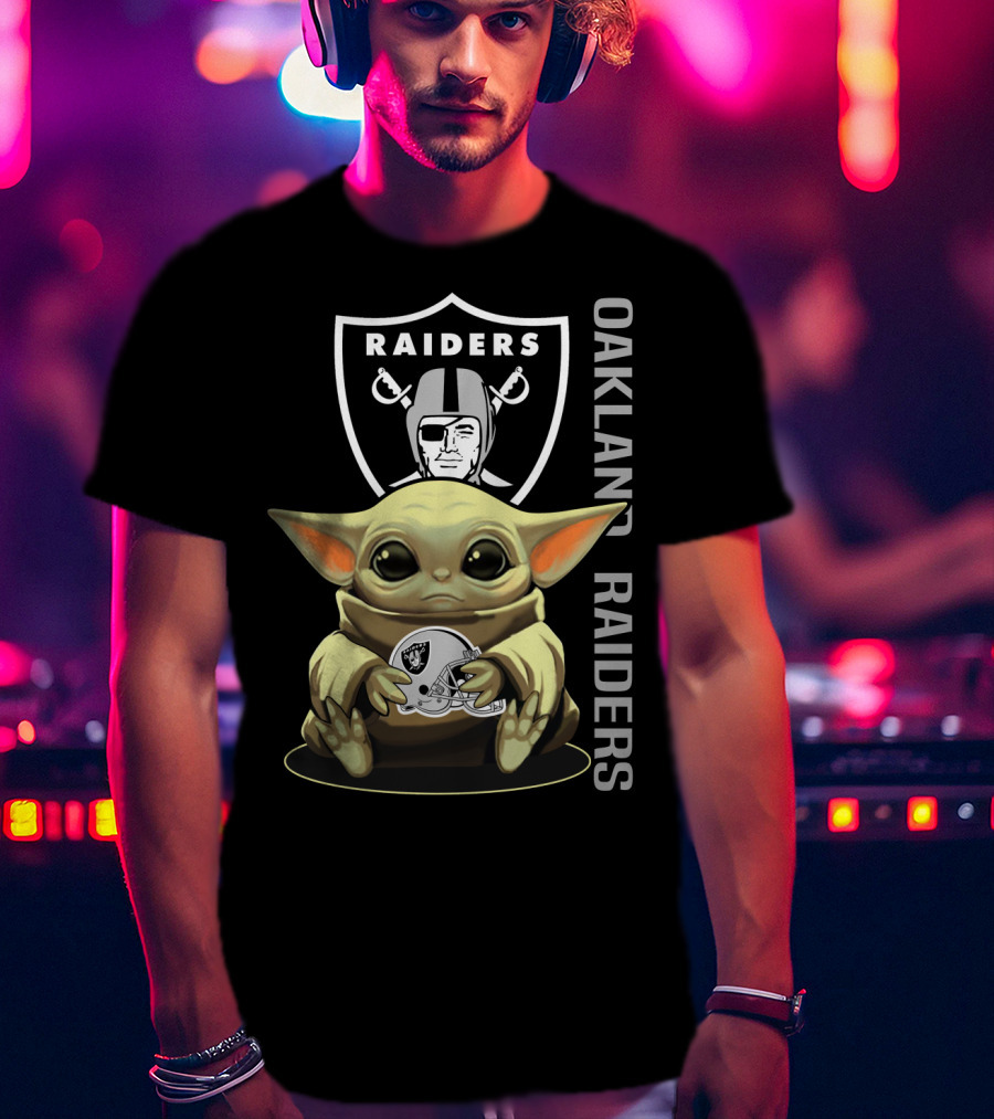 Baby Yoda Holding Oakland Raiders Helmet With Raiders Logo In Background T-Shirt