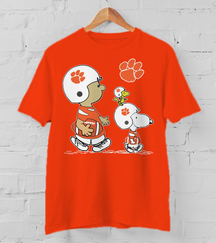 Clemson Tigers Snoopy Football Helmets And Paw Print Charlie Brown Woodstock T-Shirt