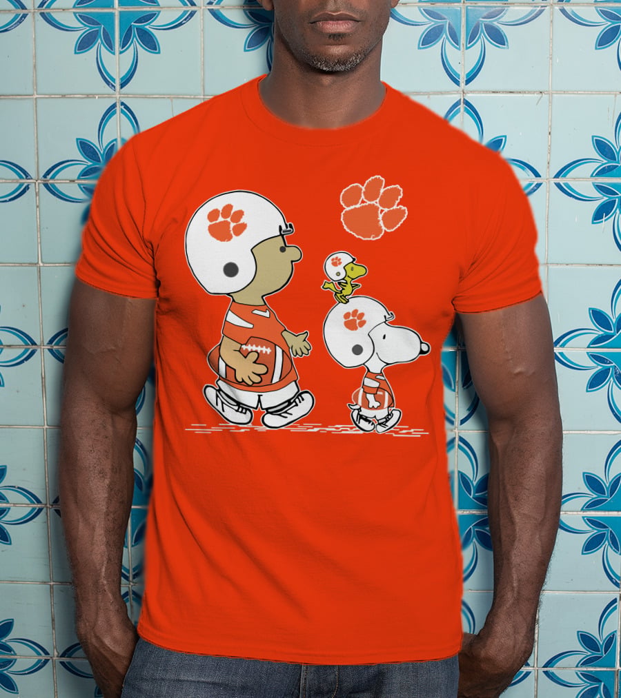 Clemson Tigers Snoopy Football Helmets And Paw Print Charlie Brown Woodstock T-Shirt