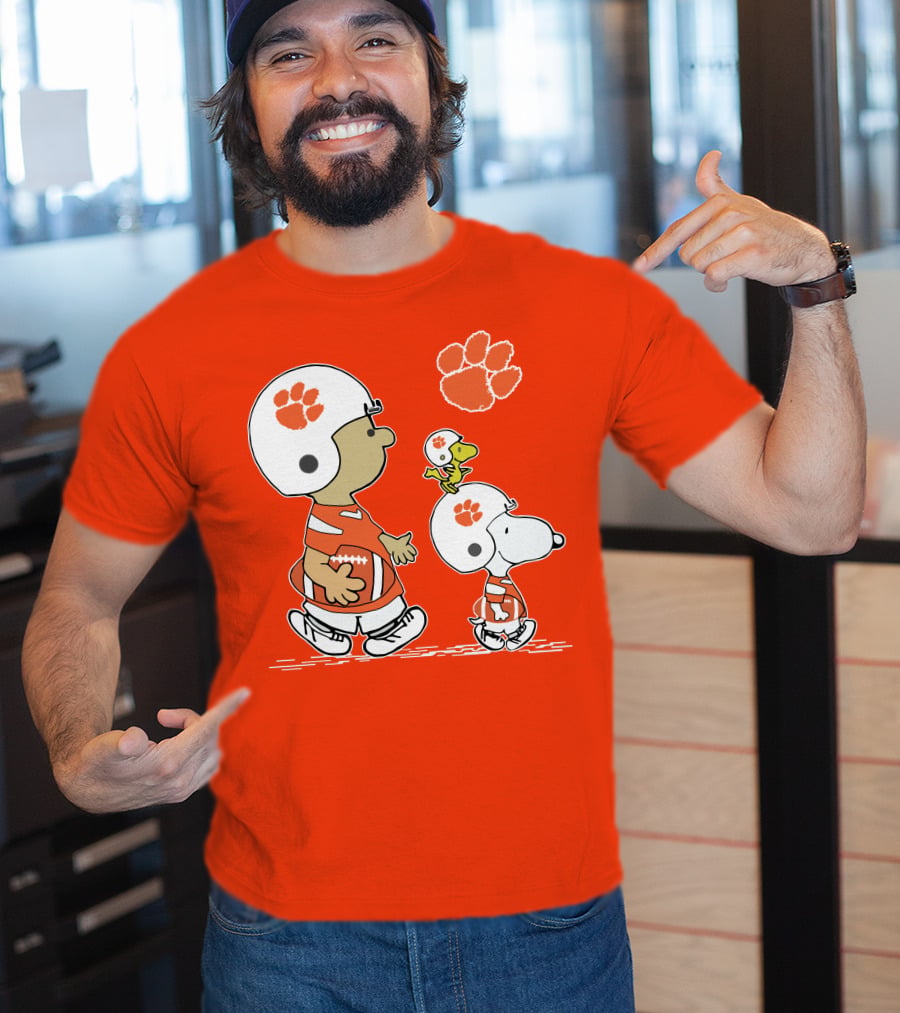 Clemson Tigers Snoopy Football Helmets And Paw Print Charlie Brown Woodstock T-Shirt