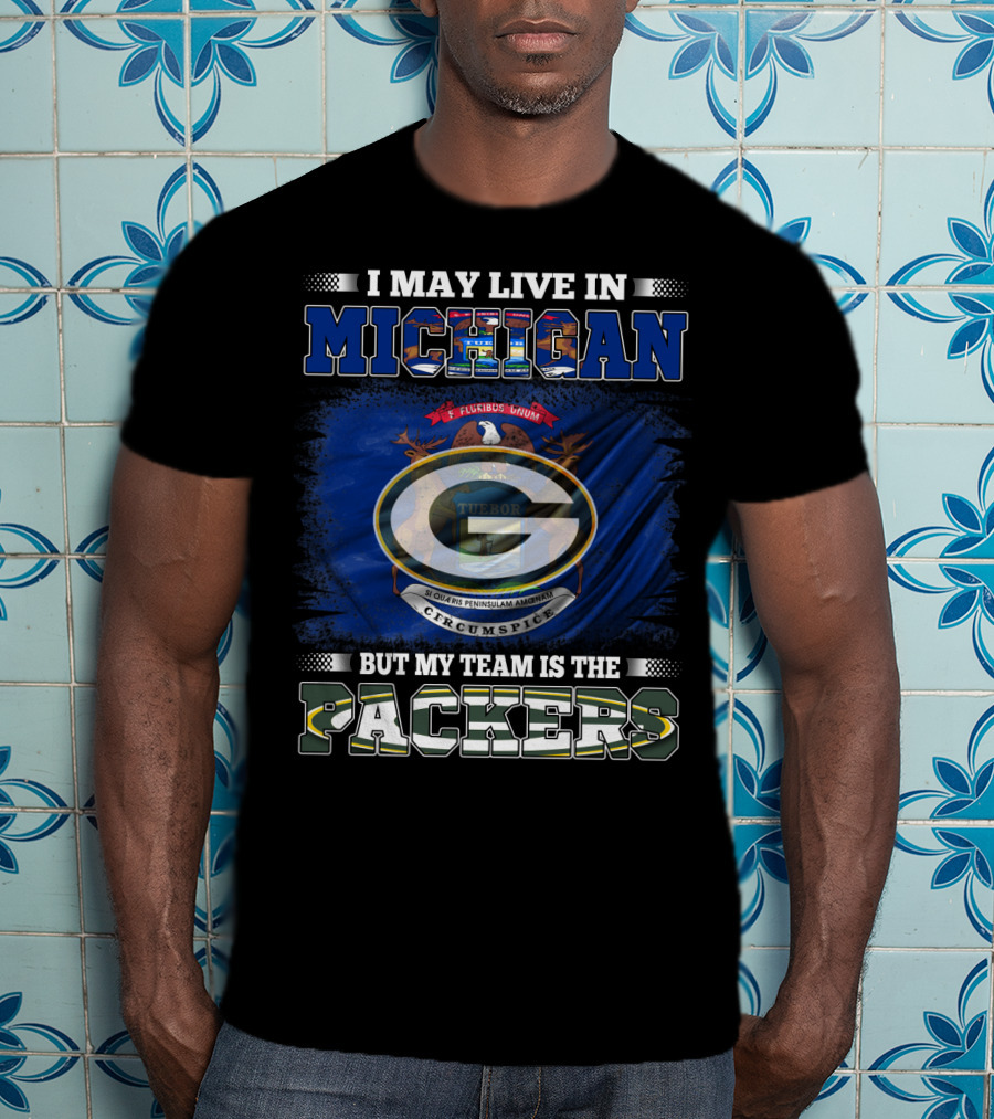 I May Live In Michigan But My Team Is The Packers With Michigan State Seal And Iconic Green G T-Shirt
