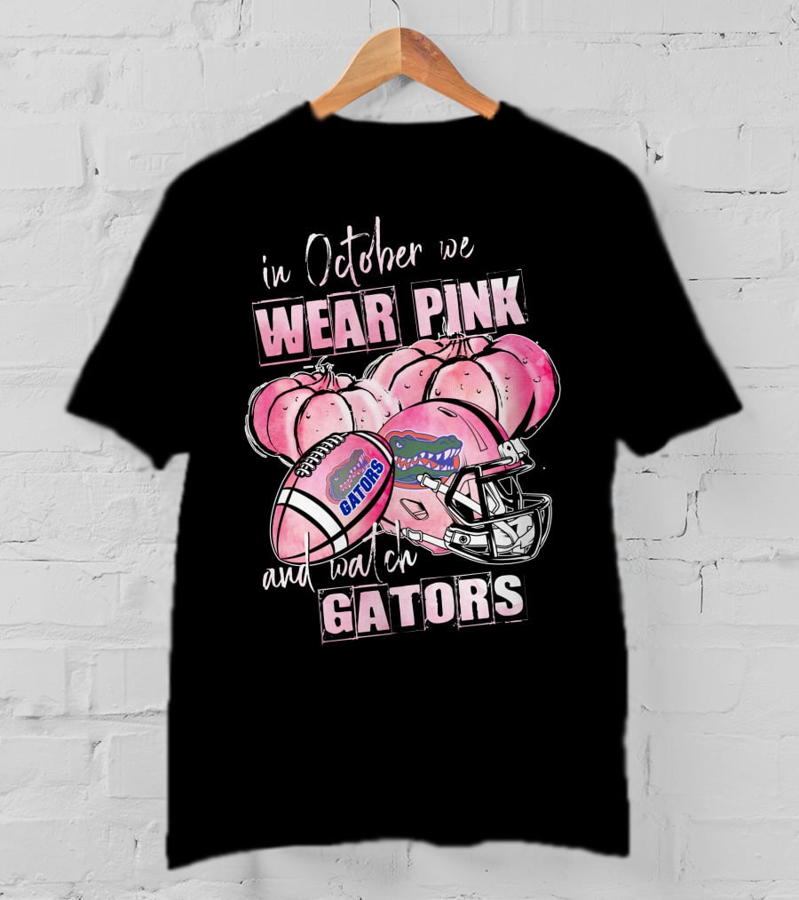 In October We Wear Pink And Watch Florida Gators Football Helmet Pumpkins T-Shirt