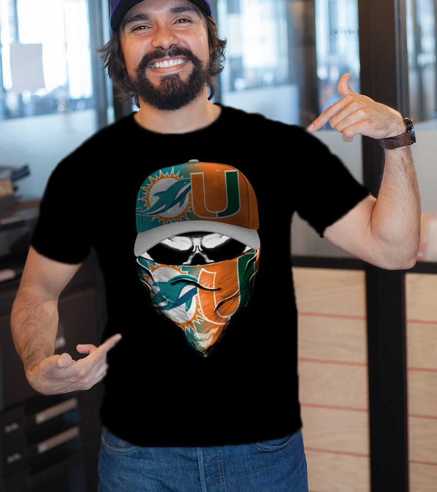 Miami Dolphins And University Of Miami Logo Face Mask And Cap Design Skull Style T-Shirt