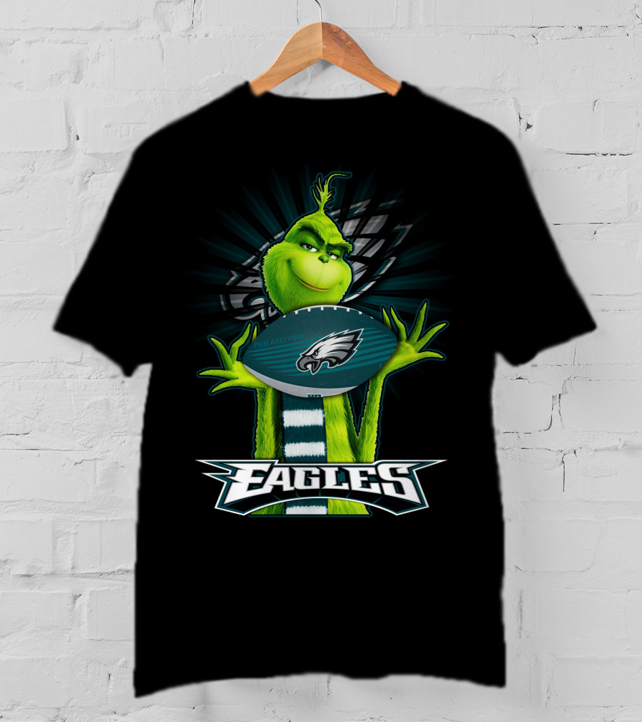 Grinch Holding Philadelphia Eagles Football With Team T-Shirt