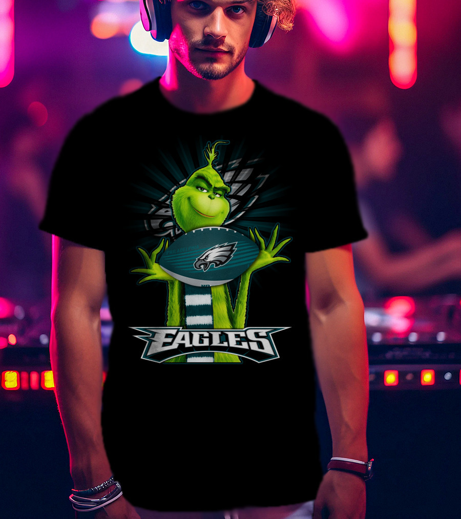 Grinch Holding Philadelphia Eagles Football With Team T-Shirt