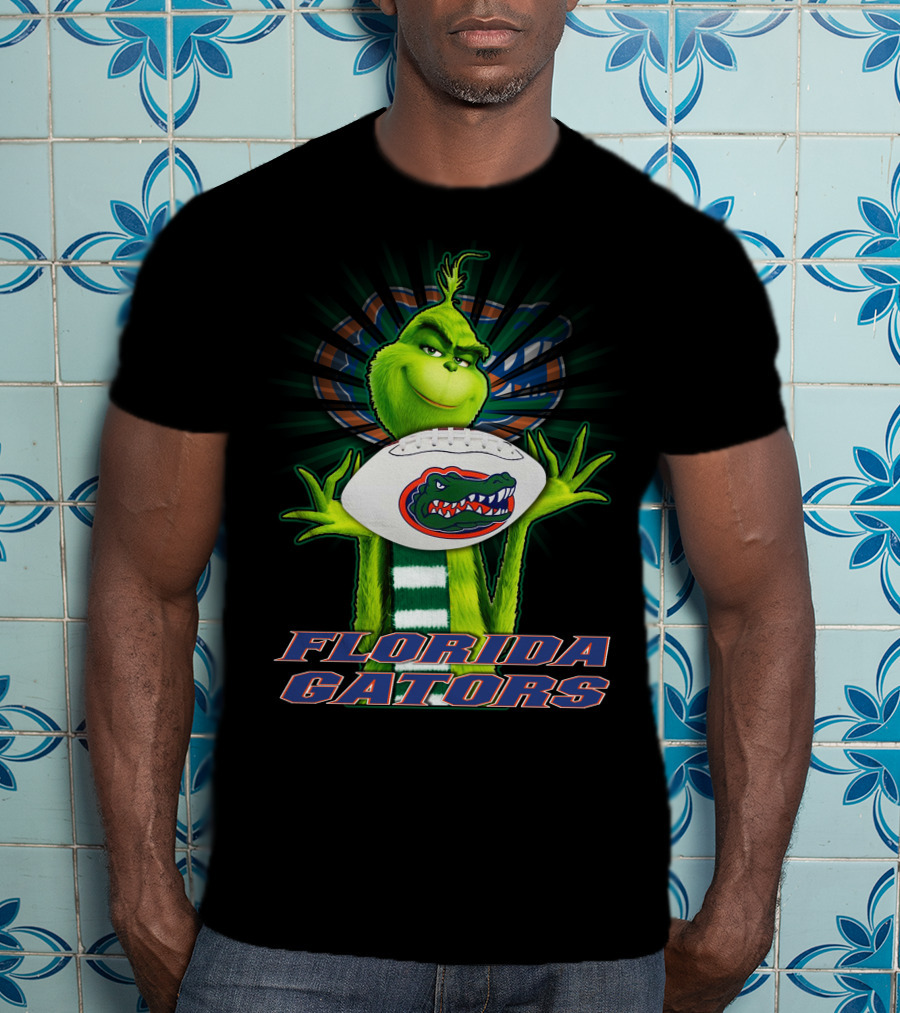 Grinch Holding Florida Gators Football T-Shirt