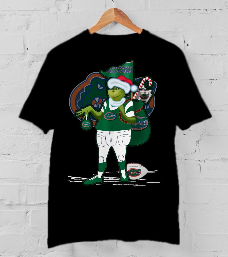 Grinchxmas Wearing Santa Hat Florida Gators With Gator Logo And Candy Cane T-Shirt