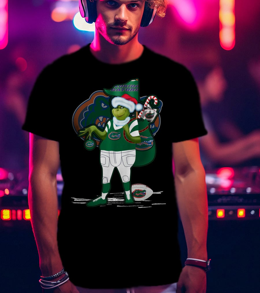 Grinchxmas Wearing Santa Hat Florida Gators With Gator Logo And Candy Cane T-Shirt