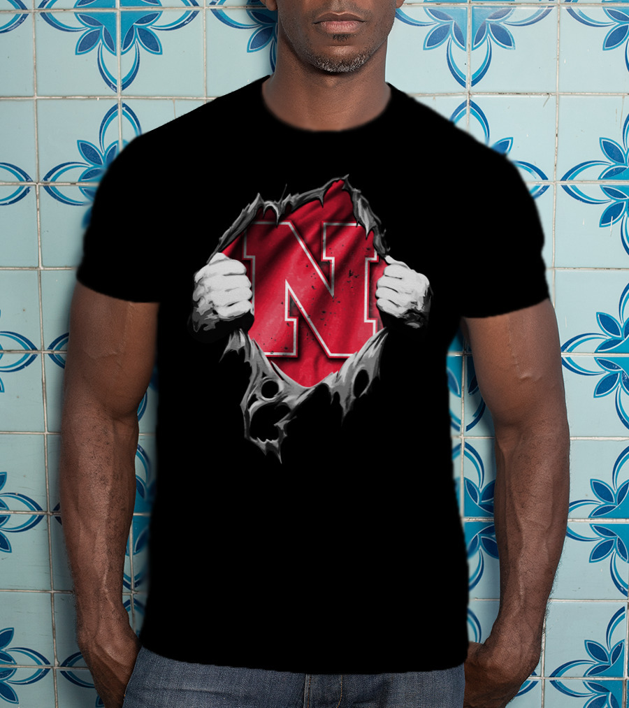 Torn Nebraska Huskers Bold N Emblem Peeking Through Ripped T-Shirt