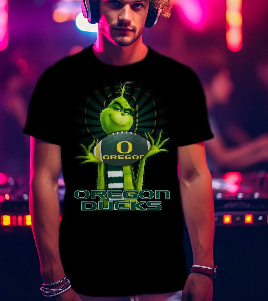 Grinch Holding Oregon Ducks Football T-Shirt