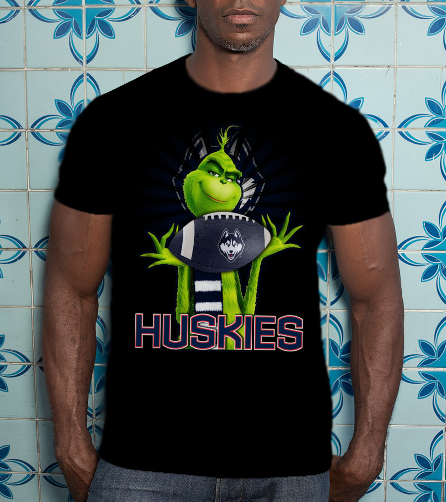 Grinch Holding Football With Huskies T-Shirt