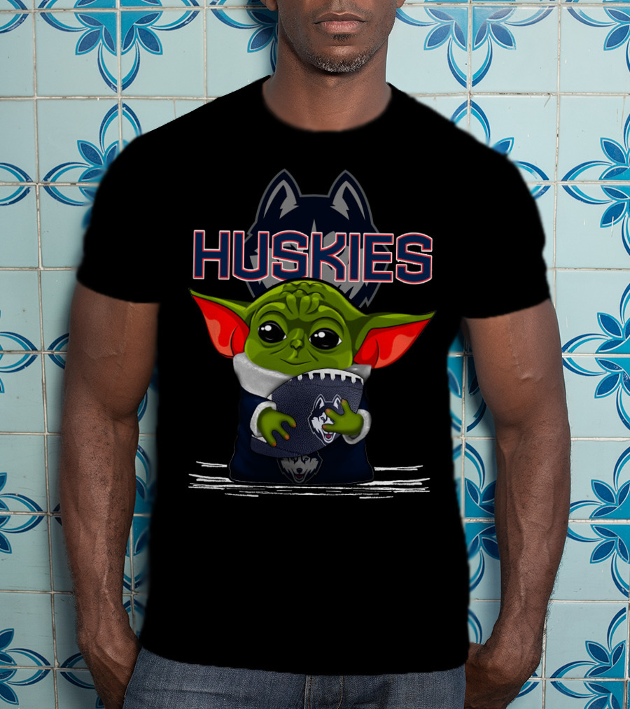 Huskies Yoda Holding Football With Connecticut Logo And Baby Yoda Character T-Shirt