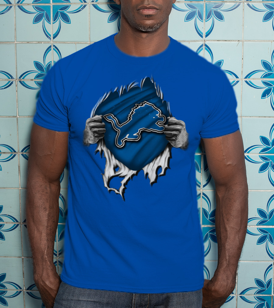 Torn DETROIT LIONS Logo Revealed Through Ripped Blue Fabric T-Shirt