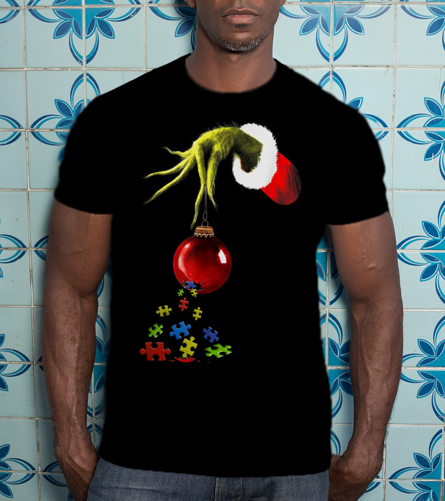 Grinch Hand Holding Red Ornament With Autism Puzzle Pieces T-Shirt