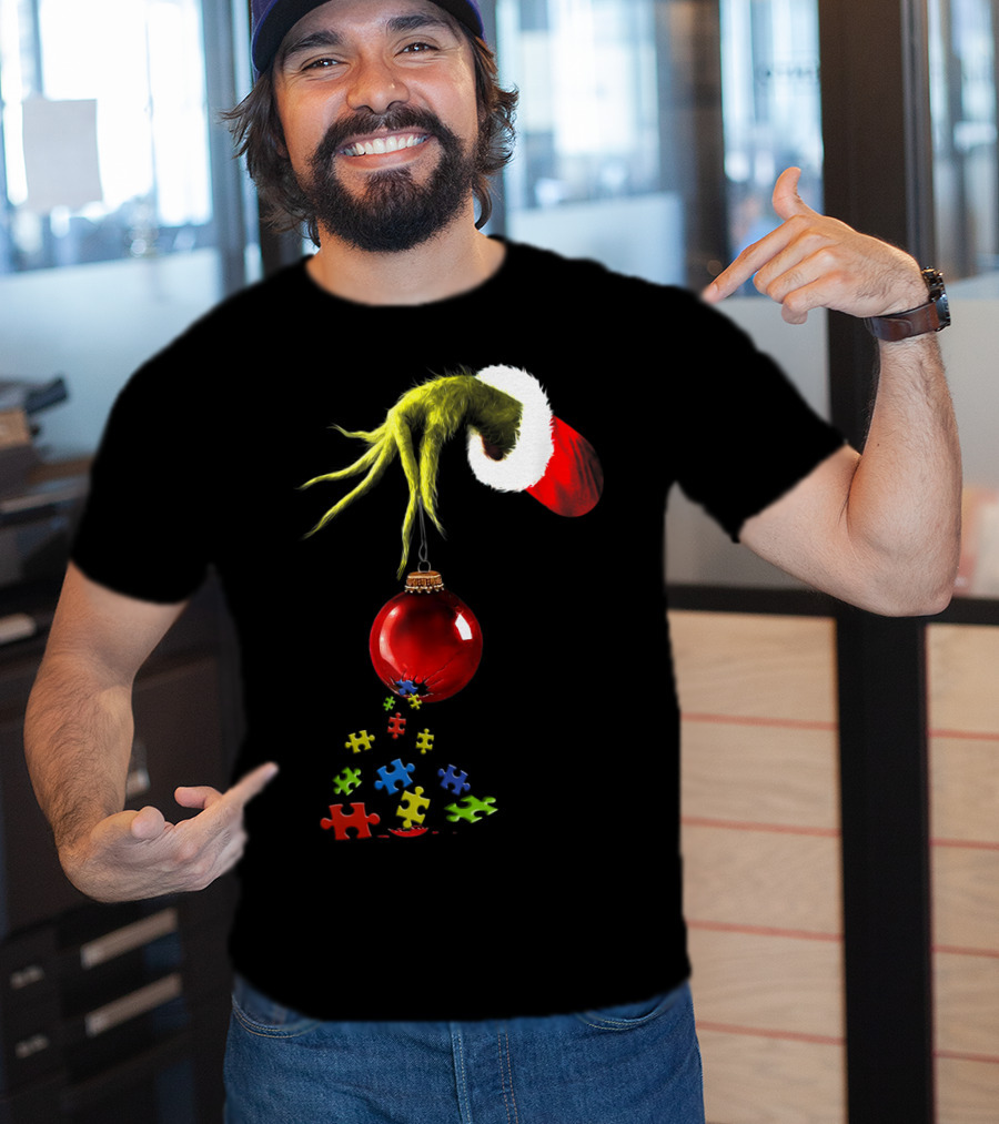 Grinch Hand Holding Red Ornament With Autism Puzzle Pieces T-Shirt