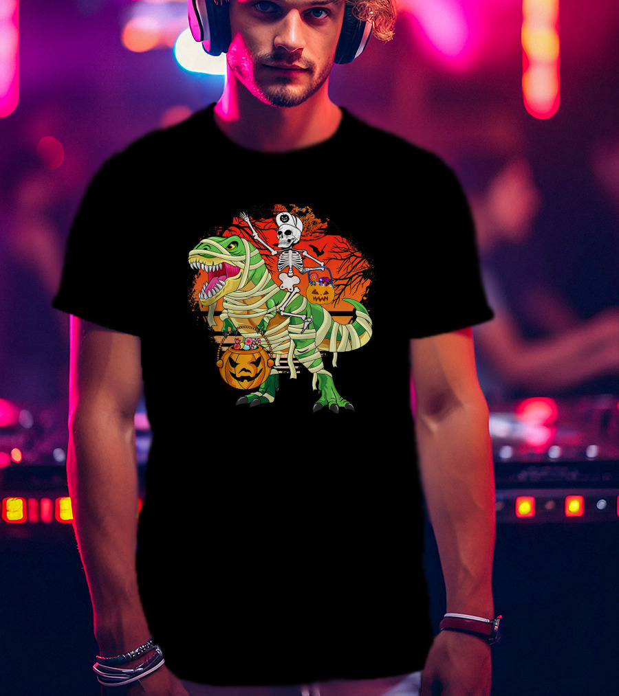 Skeleton Riding Mummy Dinosaur Rex With Halloween Pumpkins On Spooky Background T-Shirt