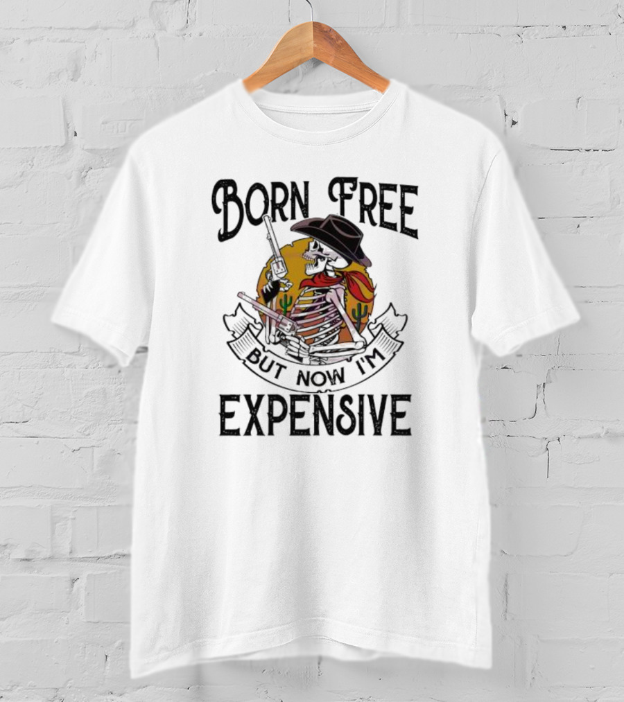 Skeleton Cowboy Born Free But Now I'm Expensive With Gun And Cactus Background T-Shirt