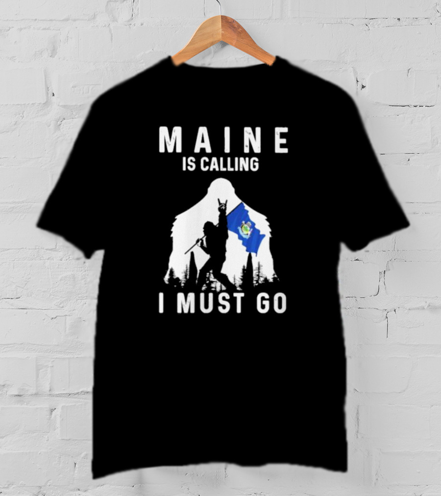 Maine Is Calling I Must Go Bigfoot Holding Maine Flag T-Shirt