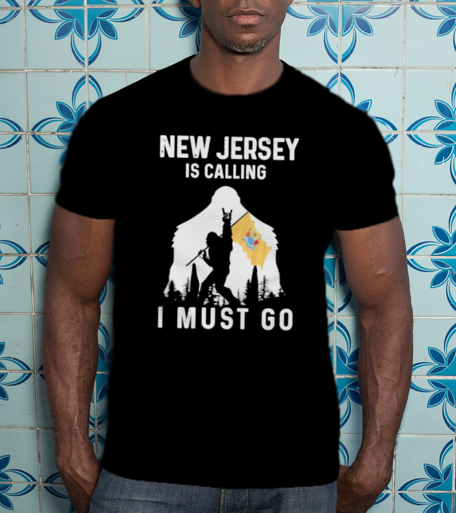 New Jersey Is Calling I Must Go Bigfoot Holding New Jersey Flag T-Shirt