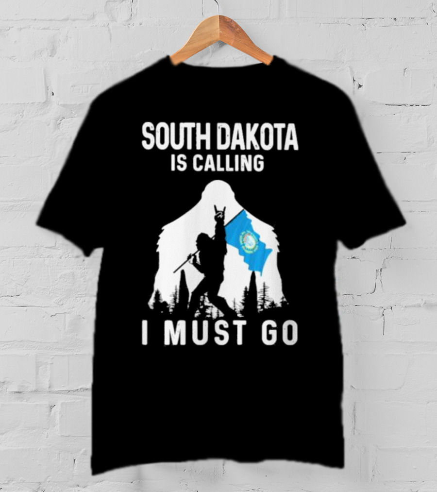 South Dakota Is Calling I Must Go Bigfoot Holding South Dakota Flag T-Shirt