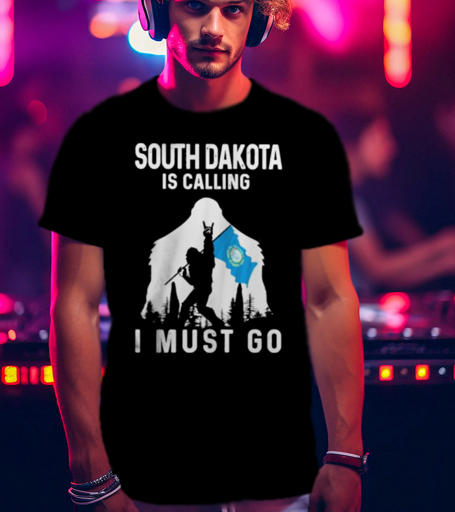 South Dakota Is Calling I Must Go Bigfoot Holding South Dakota Flag T-Shirt