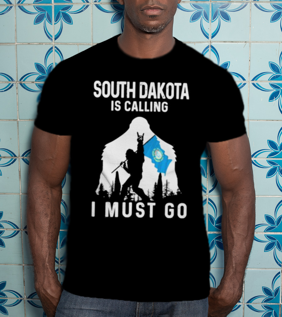 South Dakota Is Calling I Must Go Bigfoot Holding South Dakota Flag T-Shirt