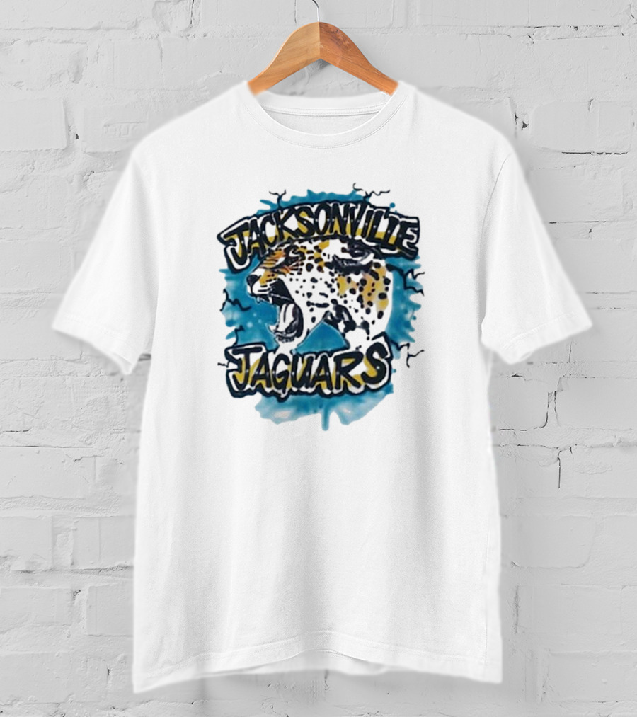 Jacksonville Jaguars Lafavre Airbrushed Roaring Jaguar With Blue Spray Background T-Shirt