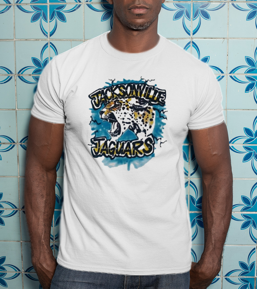 Jacksonville Jaguars Lafavre Airbrushed Roaring Jaguar With Blue Spray Background T-Shirt