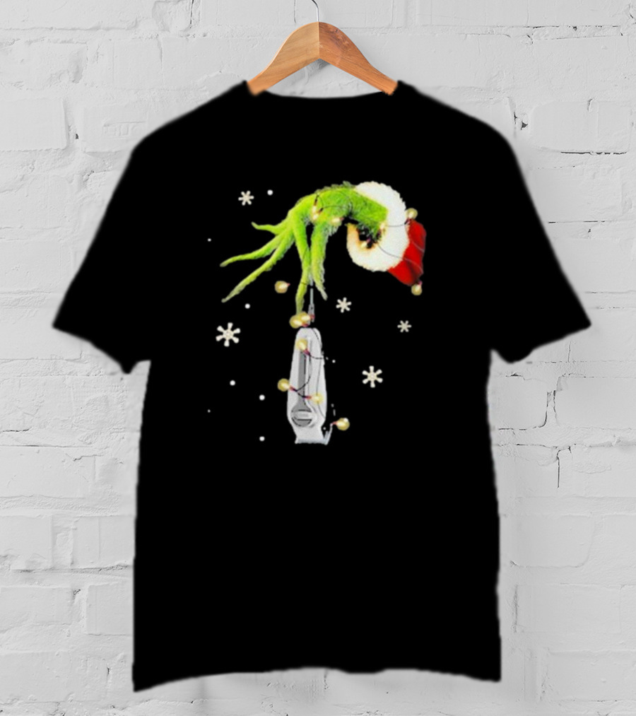 Grinch Christmas Hand Holding Clipper Snowflakes Santa Hat T-Shirt