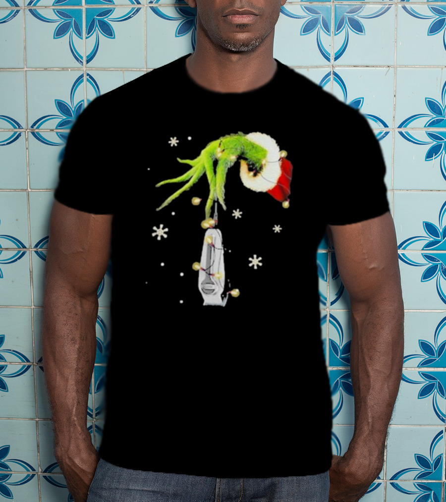 Grinch Christmas Hand Holding Clipper Snowflakes Santa Hat T-Shirt