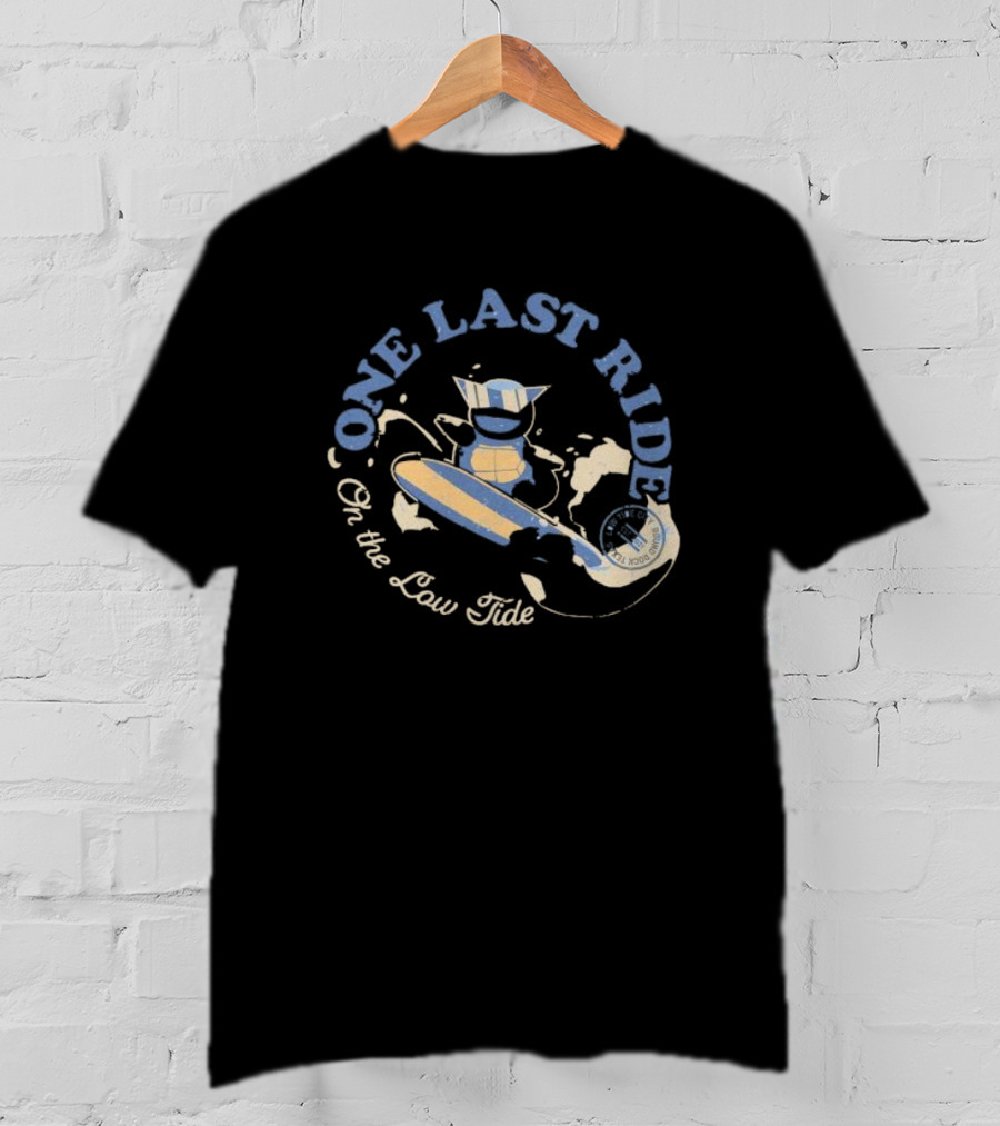 Surfing Adventure With Blue Masked Figure And Iconic Board 'One Last Ride On The Low Tide' T-Shirt
