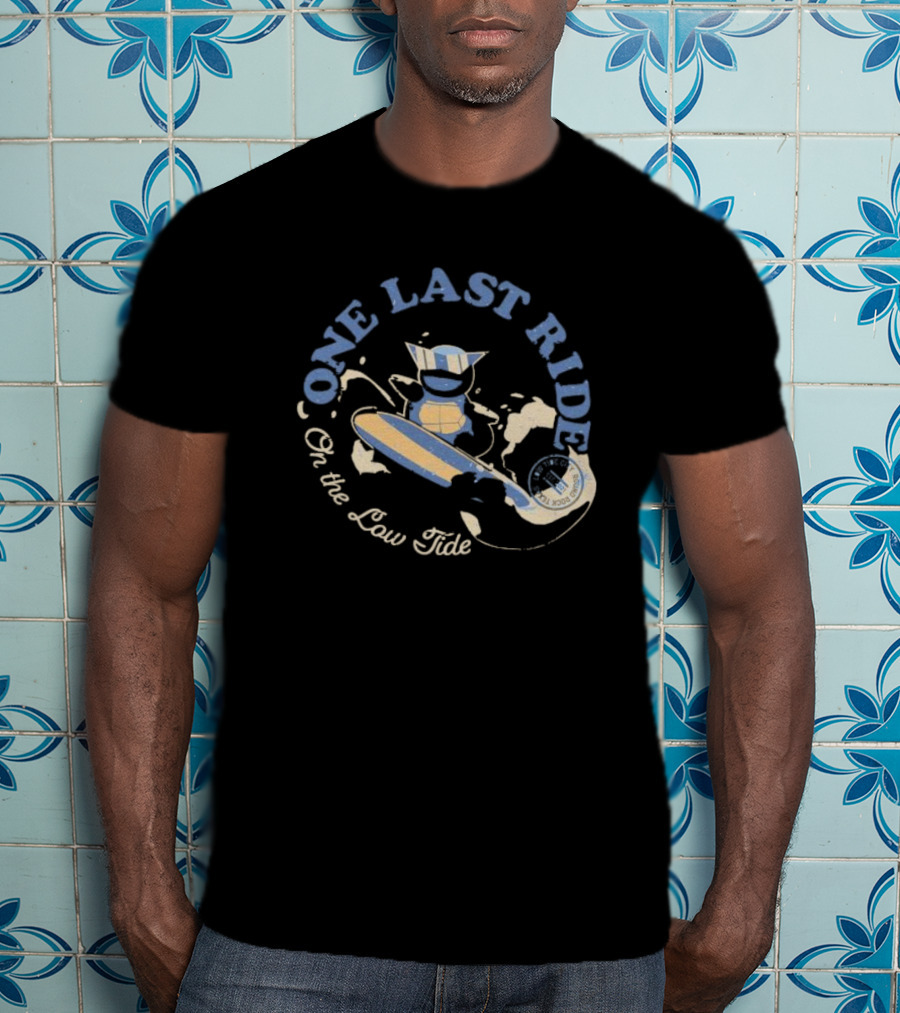 Surfing Adventure With Blue Masked Figure And Iconic Board 'One Last Ride On The Low Tide' T-Shirt