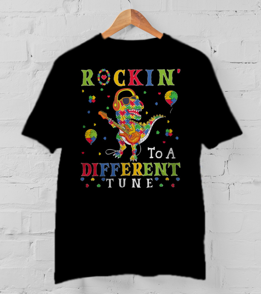 Rockin' To A Different Tune TRex Dinosaur Autism Awareness Puzzle Pieces T-Shirt