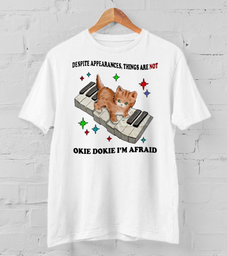 Despite Appearances Things Are Not Okie Dokie I'm Afraid Cat On Piano Keys With Colorful Stars T-Shirt