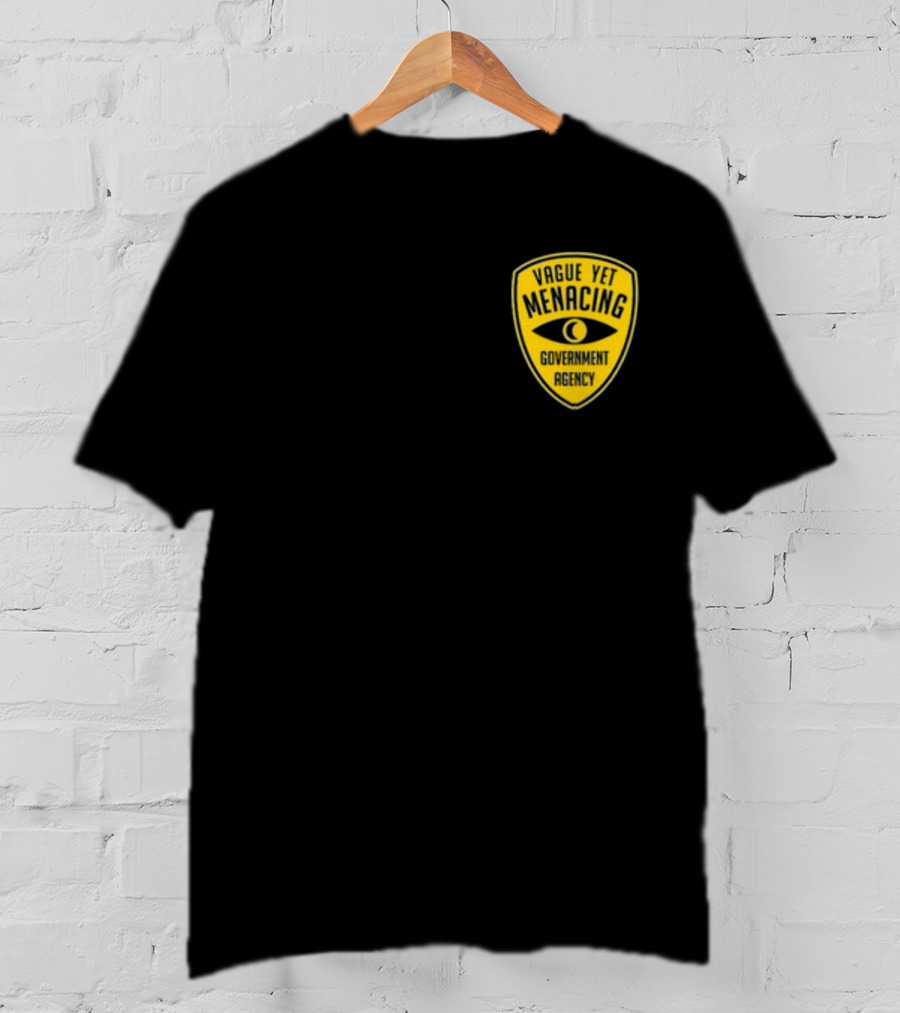 Vague Yet Menacing Government Agency Yellow Badge With Eye T-Shirt