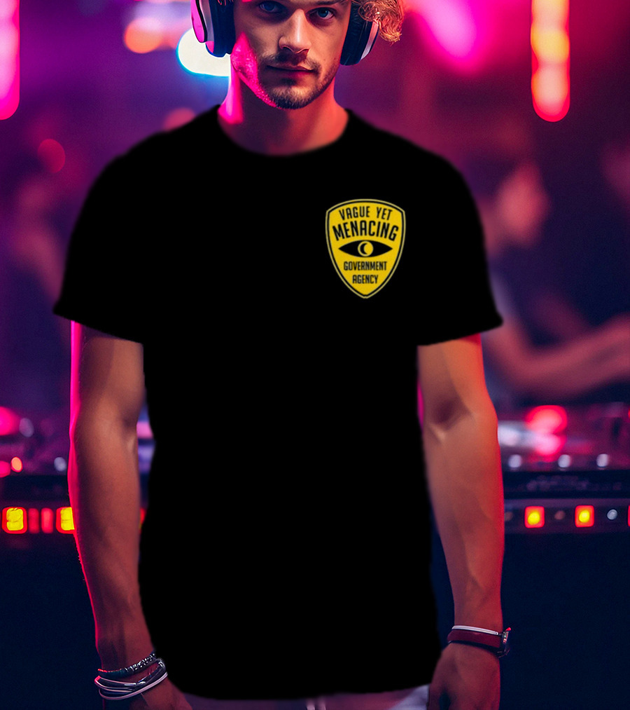 Vague Yet Menacing Government Agency Yellow Badge With Eye T-Shirt