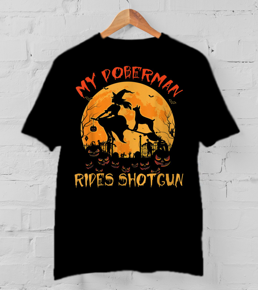 My Doberman Rides Shotgun Halloween Witch And Pumpkins Moon Scene T-Shirt