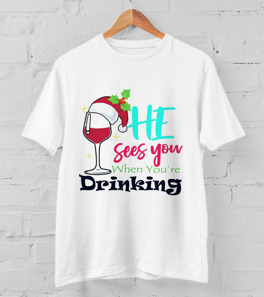 Santa Hat On Wine Glass With 'He Sees You When You're Drinking' Christmas Festive T-Shirt